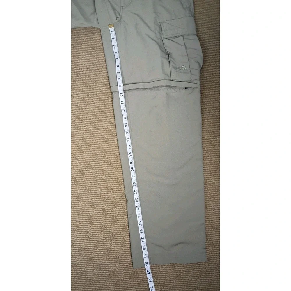 The North Face Vintage Convertible Pants Sz  34  Never Stop Exploring Tan Nylon